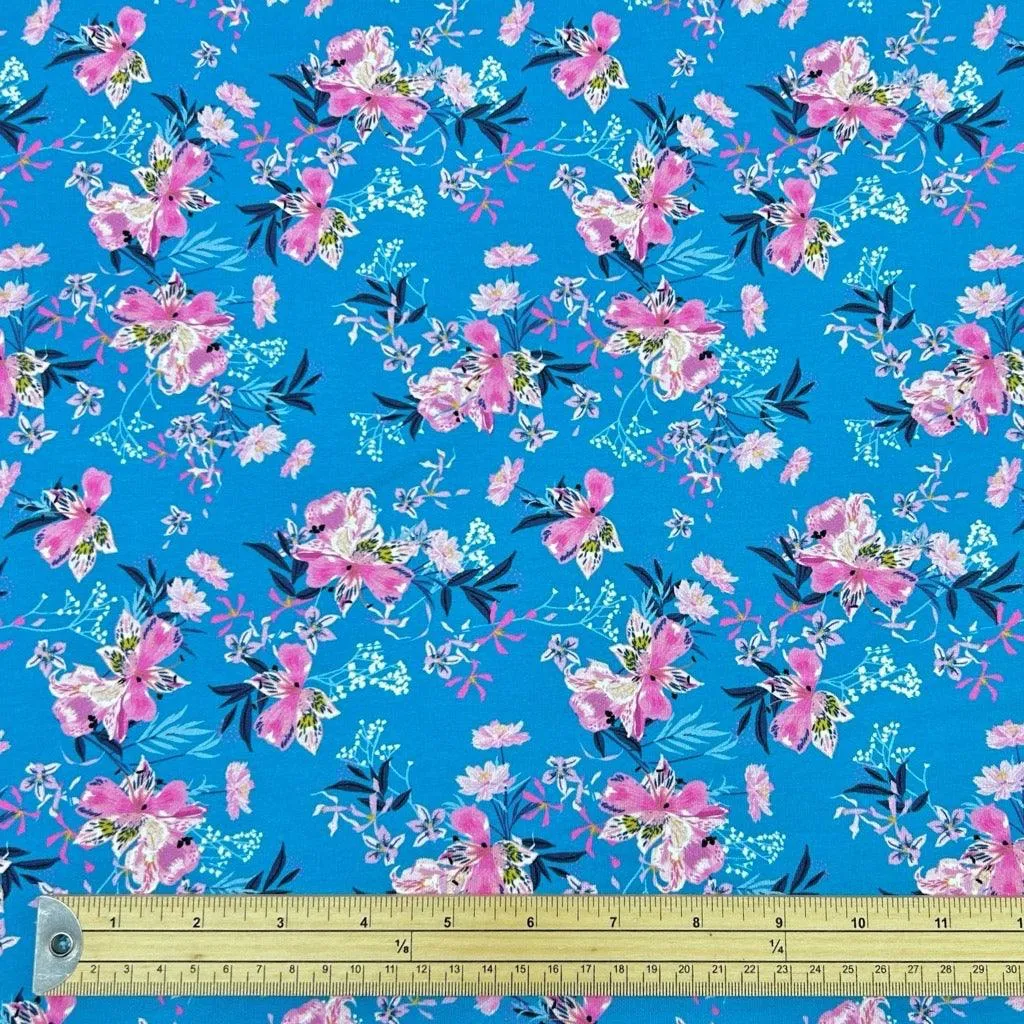 Pink Flowers on Blue French Terry Fabric
