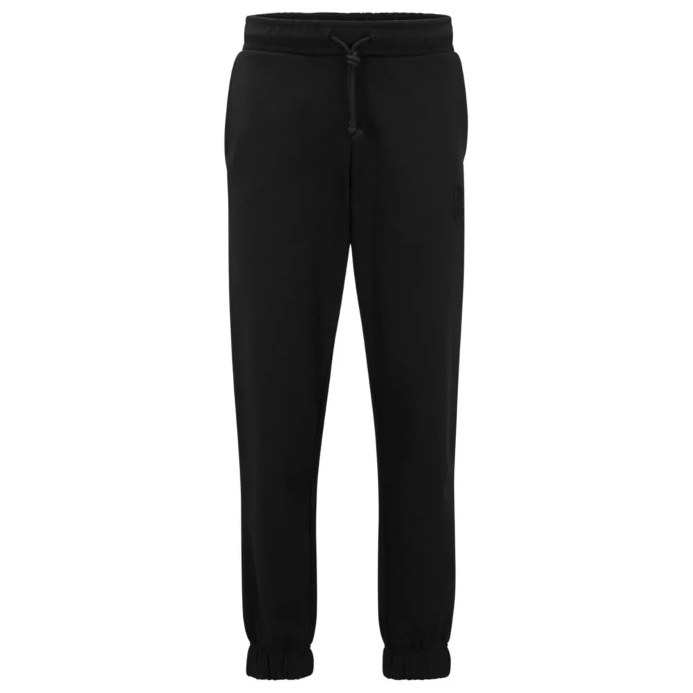 Relaxed-fit cotton-terry tracksuit bottoms with stacked logo