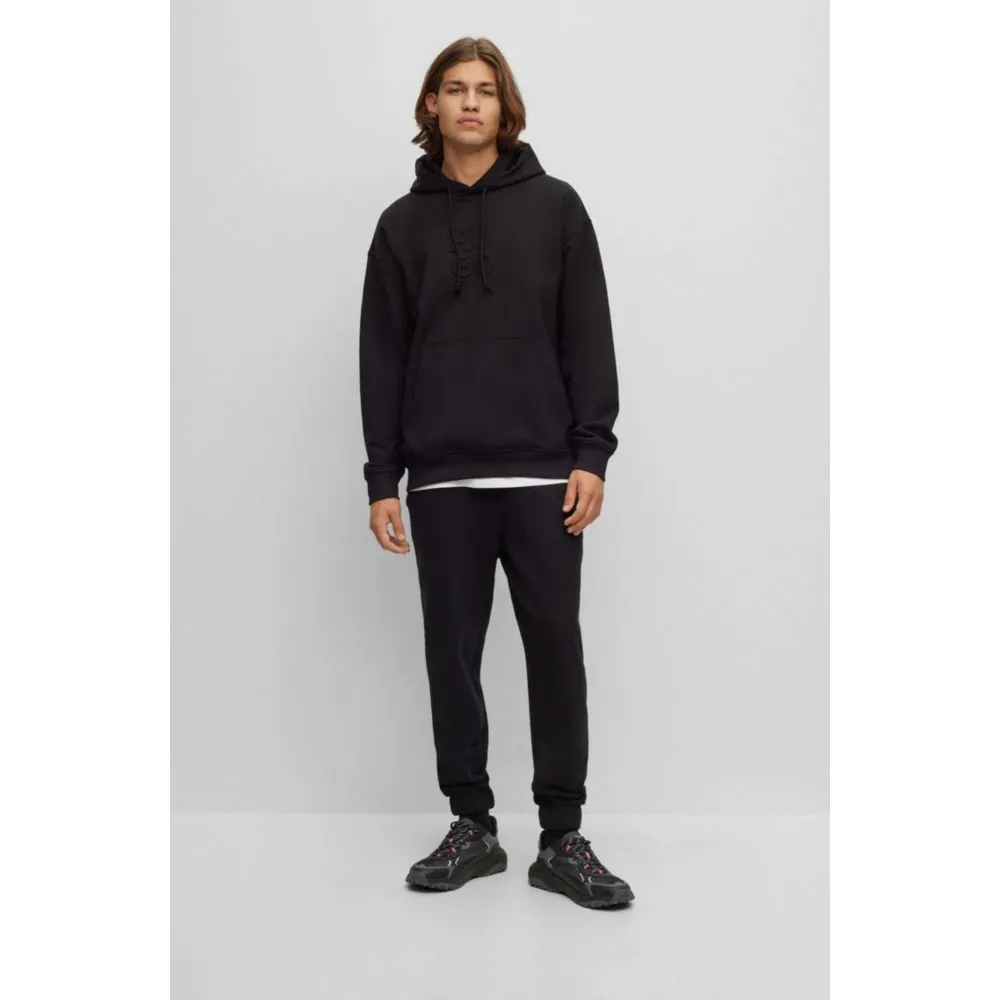 Relaxed-fit cotton-terry tracksuit bottoms with stacked logo